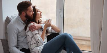 couple sitting by window