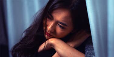 depressed girl sitting alone