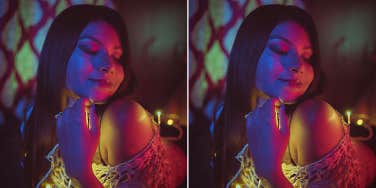 woman posing in colored lights