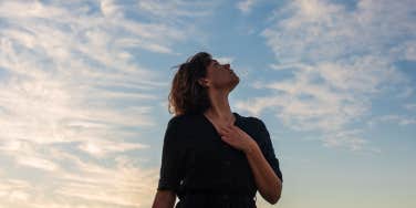 woman looking at the sky