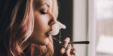 woman smoking marijuana