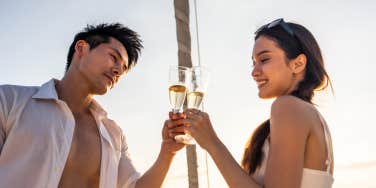couple toasting on a boat