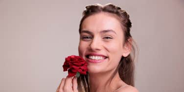 woman holding flower