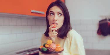 woman eating sweets