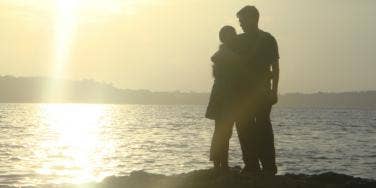 Couple on beach in sunset