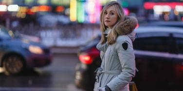 woman standing in traffic