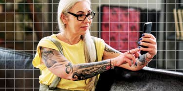 maturing woman keeping her quirky style, tattoo arms