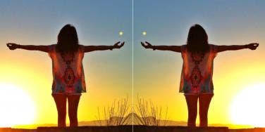 woman worshipping the sun