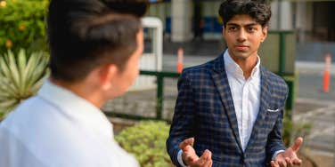 two men having conversation