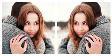 doubled image of a couple, woman looking over man's shoulder in a devious way