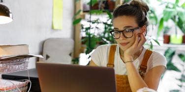 woman on computer in her home