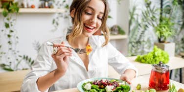 woman eating a salad