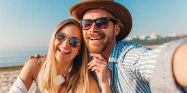 couple smiling on the beach