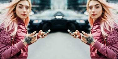 woman listening to songs on her phone