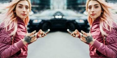 woman listening to songs on her phone