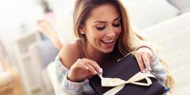 woman opening gift