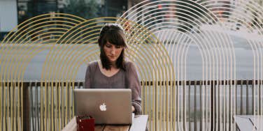 Woman alone at a coffee shop