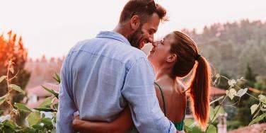 woman and man embracing 