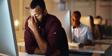 frustrated man at his desk