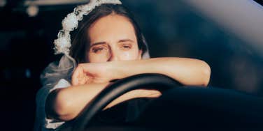 bride crying in the car
