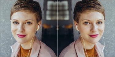 mirrored image of professional-looking woman wearing headphones