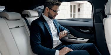 man in car going to job interview