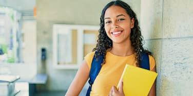 Content college student in yellow