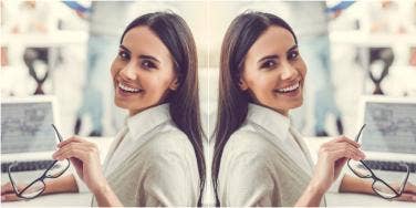 mirrored image of office woman