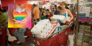 Woman shopping at Target, woman holding a rainbow heart