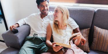 couple on the couch looking at each other