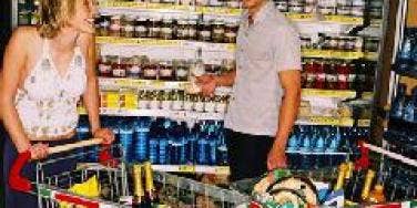 couple meets in food store