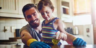 dad and daughter cleaning