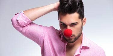 man with clown nose