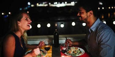 man and woman on nighttime date