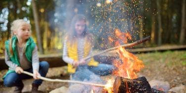 mom having campfire with kids