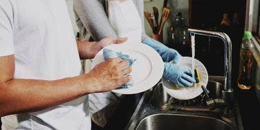 person doing dishes