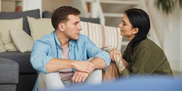 man and woman talking to each other