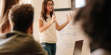 Girl taking charge of a meeting 