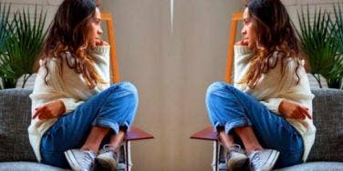 worried woman sitting on a chair
