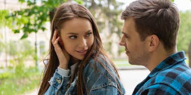 woman looking at man flirtatiously