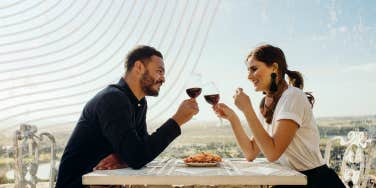 couple with wine on their first date together