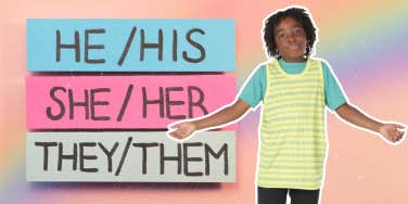 Young boy shrugging gender fluidity 