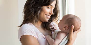 woman holding baby