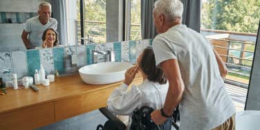 Elderly looking at themselves in the mirror