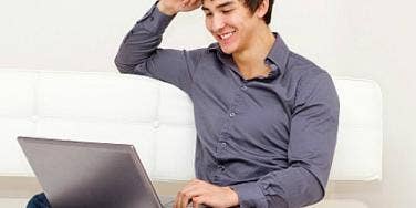 young guy with laptop computer