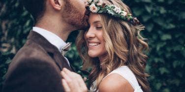 husband and wife embracing