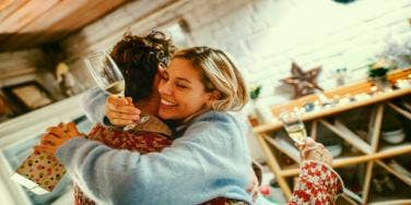 man and woman hugging