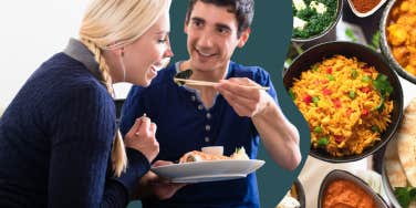 Man sharing food with woman