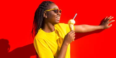 happy girl eating ice cream cone