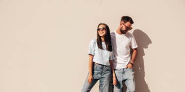 man and woman in matching outfits